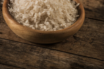 rice, jasmine rice, mali rice in Ladle and basket on the wood background