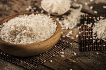 rice, jasmine rice, mali rice in Ladle and basket on the wood background