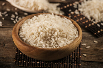 rice, jasmine rice, mali rice in Ladle and basket on the wood background