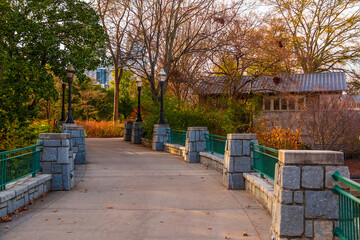 The stone bridge on the Lake Clara Meer in the Piedmont Park in autumn day, Atlanta, USA