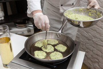 Cooking pancakes in a frying pan, frying