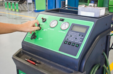 Man's Hand Working With Nitrogen Tire Filling System Machine.