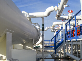 Heat exchangers in a refinery. Heated gasoline air cooler. The equipment for oil refining
