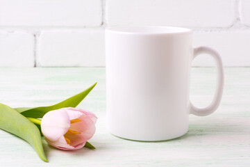 White coffee mug mockup with  pink tulip