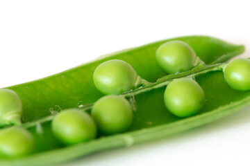 Open snap pea isolated on white background