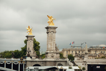 Golden statues on the Pont Alexandre III bridge