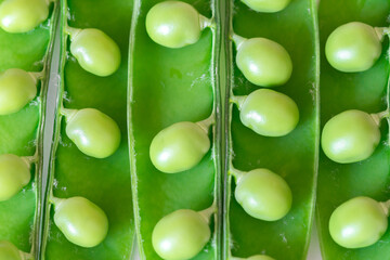 Open fresh green pea full screen background