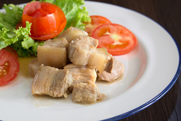 Stir fried Salted pork and vegetables in white dish chinese food / Selective focus