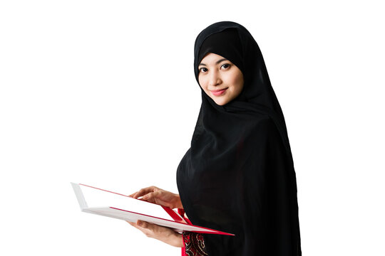 Portrait of beautiful young muslim woman with file folder on a white background.