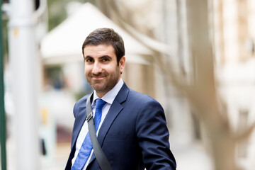 Fototapeta premium Portrait of handsome businessman outdoor