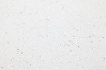 Water drops on glass, Rain droplets on glass background.