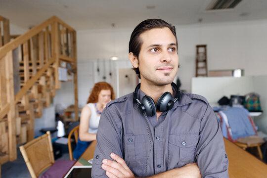 Portrait of young man in office