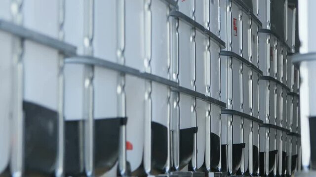 Camera Moves Slowly along Intermediate Bulk Containers
