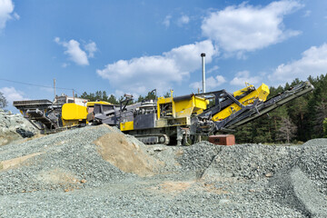 Open pit mining and processing plant for crushed stone, sand and gravel to be used in the roads and construction industry