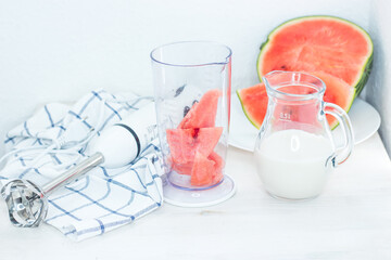 Watermelon smoothie. Preparation of smoothies. Summer cocktail.