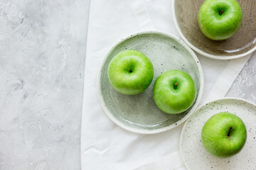 ripe green apples stone table background top view space for text