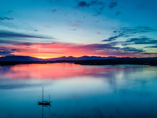 Aerial of an amazing sunset with sailing vessel Loch Creran, Barcaldine, Argyll