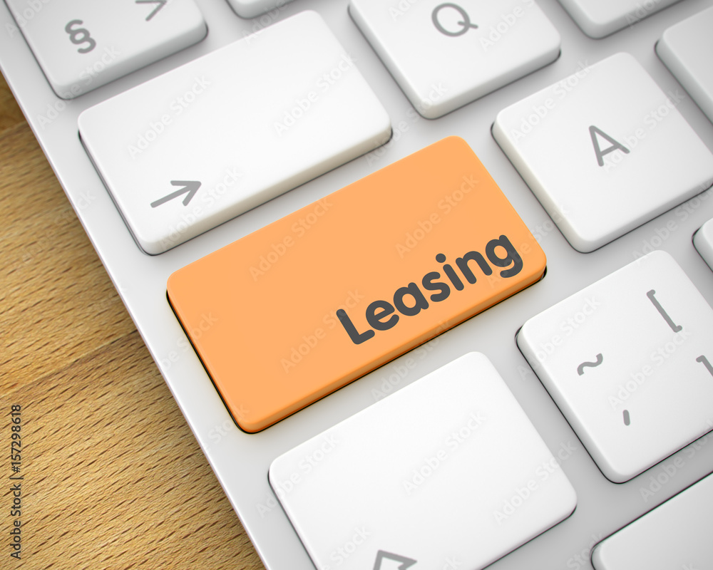 Poster slim aluminum keyboard keypad showing the message leasing. message on keyboard orange button. busine