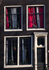 Typical crooked house in the canal area of Amsterdam, Netherlands