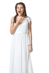 Fototapeta premium girl in a white dress surprised and holds the arm to the chest