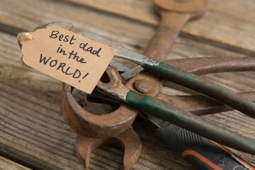 Close up of greetings on rusty work tools