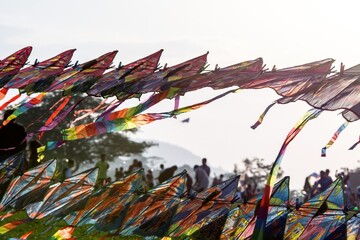 Street hawker selling Kites at Kites Park . Close up photo.