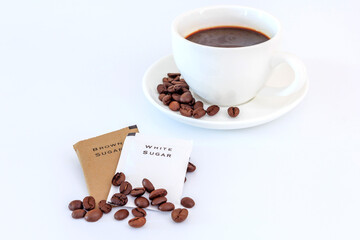 A cup of black coffee and sugar sachet for refreshing in the morning, Top view with copy space and text.