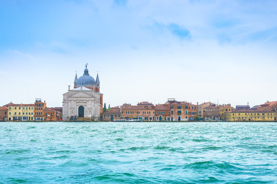 Venice, Italy - April 27, 2017: Beautiful .canal church and Venice residential style beside Grand Canal in Venice, Italy.
