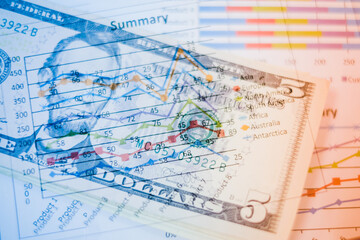 Fototapeta na wymiar Double exposure of graph and dollars banknotes