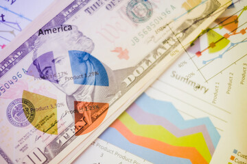 Double exposure of graph and dollars banknotes