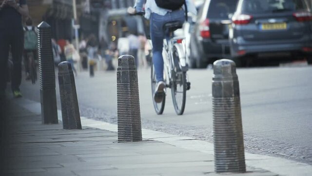 Slow motion of cyclist commuter in big city