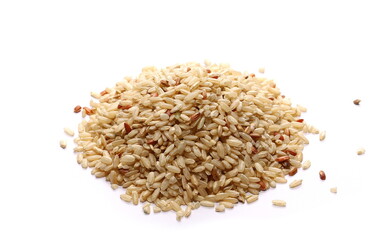 Integral, brown rice pile isolated on white background
