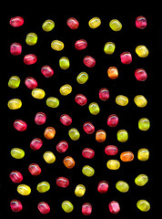Bright colored sweet candy isolated on a black background