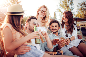 Happy friends having fun on beach