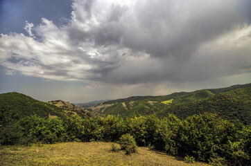 Obraz premium Majestic cloudy mountains landscape. Dramatic sky clouds. Azerbaijan, Big Caucasus mountains. Ganja