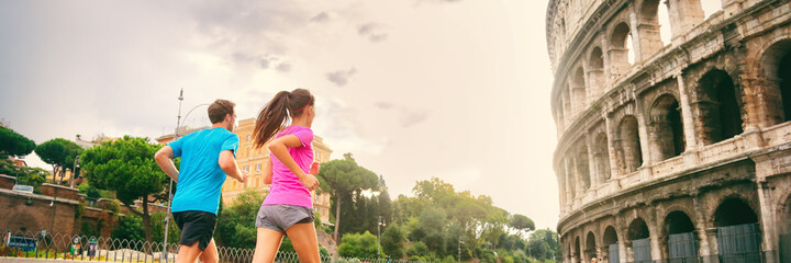 Runners running next to colosseum in Rome city, Italy, Europe travel destination. Healthy active people lifestyle. Banner panorama crop. - obrazy, fototapety, plakaty