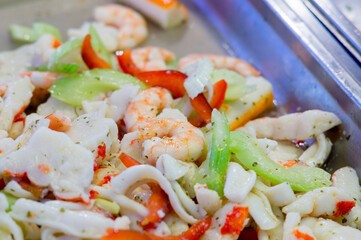 Sushi sea food in the restaurant close up. King prawns, seaweed and caviar for gourmets.