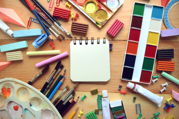 Stationery on a wooden background