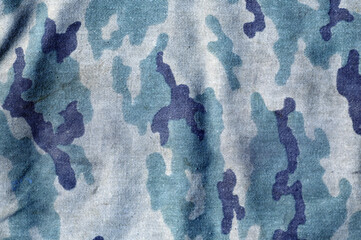 Weathered camouflage uniform pattern. © pavelalexeev