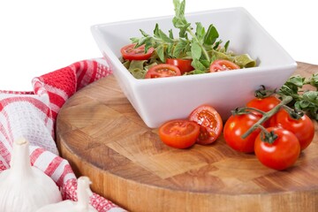 Fettuccine spinach pasta with tomatoes, garlic and napkin cloth