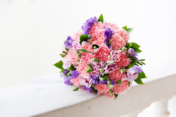 Beautiful wedding bouquet of pink carnations