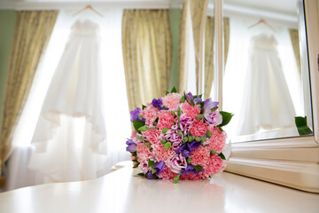 Beautiful wedding bouquet of pink carnations