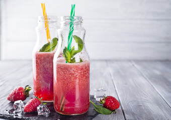 Strawberry smoothies in bottles