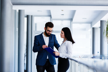 Business couple discussing about their job and planing how to success