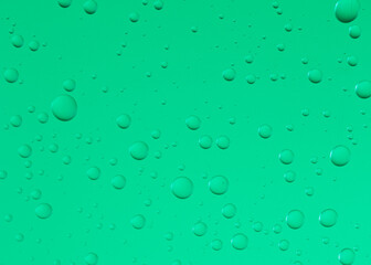 water droplets on green glass
