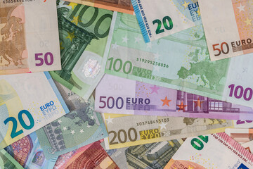 Fototapeta na wymiar Many different banknotes of Euro currency. close up
