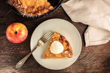 Overhead photo of piece of apple pie with ice-cream