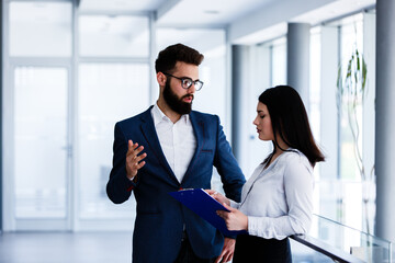 Business couple discussing about their problems in job and trying to solve it