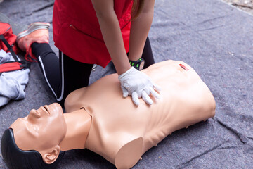 First aid training concept. CPR. Cardiac massage.