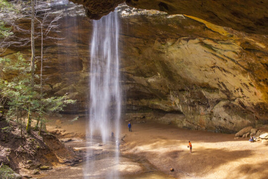 A view of the Ash Cave waterfall at Hocking Hills State Park from behind the waterfall, looking toward the cavern in April.
